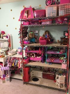 a room filled with lots of dolls and toys