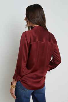 This Dani blouse is expertly crafted from 100% silk, giving it a luxurious feel and elegant drape. The luxe hue and 3/4 sleeves make it a versatile addition to any wardrobe, while the button down design adds a touch of sophistication. Perfect for work and play, the Dani Blouse is one of French Cuff's best-sellers. 100% silk charmeuse Three-quarter sleeves High-low shirttail hem 2-button cuffs Front button closure Resort Accessories, Three Quarter Sleeve Blouses, Knit Denim, Kids Denim, Silk Charmeuse, Summer Skirts, Denim Flares, Three Quarter Sleeves, Quarter Sleeve