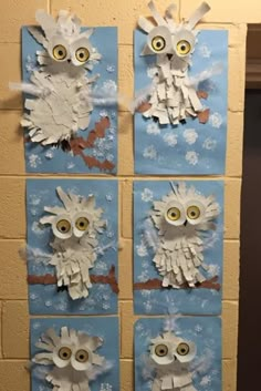 four owls made out of construction paper on a wall