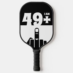 a black and white paddle with the number 79 on it's side, pointing to the right