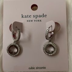 Kate Spade Spot The Spade Pave Huggie Earrings *New With Tags *Silver-Tone Pave Huggie Earrings *Silver-Tone Pave Spot The Spade Round Drop Charm *Approximate Dimensions: 1" In Length *Includes Kate Spade Dust Bag Silver Kate Spade Earrings Gift, Kate Spade Drop Earrings As Gift, Kate Spade Silver Formal Jewelry, Kate Spade Silver Jewelry For Formal Occasions, Kate Spade Silver Wedding Jewelry, Kate Spade Dangle Earrings As A Gift, Kate Spade Dangle Earrings For Gifts, Huggie Earrings Silver, Spade Jewelry