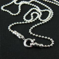 Material: 925 Sterling silver made in Italy. Size: ball is 1.2mm. Length: 18 inches. Weight: 3.4 grams Quantity: 1 piece For all available sizes of this chain, click here: https://www.etsy.com/listing/486753388 For this chain in gold plated sterling silver, click here: https://www.etsy.com/listing/486754968 For this chain in oxidized sterling silver, click here: https://www.etsy.com/listing/500247847 Please convo me for large quantity. Pictures show the shape of the chain,for actual size please Rose Gold Chain Necklace, Extra Long Necklace, Vintage Sterling Silver Jewelry, Wholesale Jewelry Supplies, Beaded Ball, Sterling Silver Anklet, Ball Chain Necklace, Sterling Silver Chain Necklace, Silver Anklets