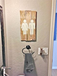 a bathroom with a towel hanging on the wall