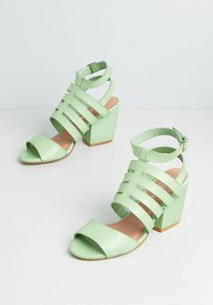 You’ll have lots to walk and talk about in these mint green heels from Chelsea Crew thanks to their bold, head-turning style. With a faux-leather strappy upper with sleek cut-out design, an ankle strap, and leather linings, all sitting atop a covered, chunky block heel, this pair is too luxe not to talk about.Man-made upper and sole. Leather lining. Imported Chelsea Crew brand shoe size 36 corresponds to US size 5; 37 to 6; 38 to 7; 39 to 8; 40 to 9; 41 to 10. Heel measures 3.25 inches. Adjustable straps. Beige Ankle Strap Heels, Mint Green Heels, Vintage Inspired Shoes, Trendy Womens Shoes, Mid Heels Pumps, Green Heels, Mid Heel Sandals, Strappy High Heels, Colorful Shoes