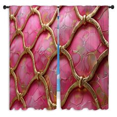 two pink and gold wall hangings with decorative designs