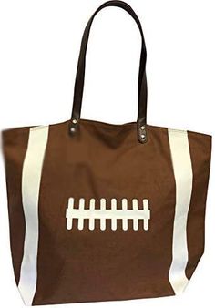 PRICES MAY VARY. SIZE: Oversize tote bag. Measures 21" L X 17" H X 8" W & 11" Handle Drop. FOOTBALL PRINT: Makes a great tote for the Football Mom to stuff with all the essentials for the football field. Makes a great gift for that special Football Team Mom. MATERIAL: High Quality Cotton Canvas in an OFF white/light tan color. Polyester lining. Zipper pouch inside is the perfect place for keys or cell phone. Magnetic Snap Closure. Dark Brown Soft PU leather handles. USES: Travel bag, Beach bag, Football Team Mom, Baseball Tote Bag, Football Canvas, Football Bag, Football Jewelry, Utility Tote Bag, Large Utility Tote, Mom Bag, Browns Football