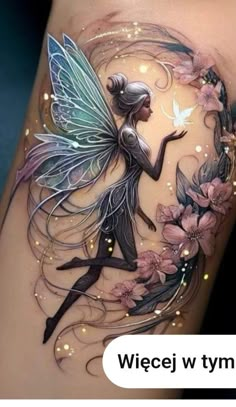 an artistic tattoo with a fairy on it's thigh and flowers in the background