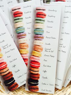 a basket filled with lots of different colored macaroons