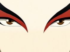 the eyes of a woman with red and black hair are shown in this animated image