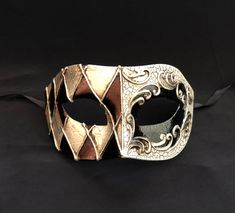 This Men's Masquerade mask is hand painted and has a diamond style black and silver pattern on right side of mask. Mask also has raised detail and a unique look. Great for any Masquerade mask party! Size 7"W x 4"H Mens Masquerade Mask Black, Masquerade Mask Men, Masquerade Mask Party, White Masquerade Mask, Item Reference, Mens Masquerade Mask, Venetian Masquerade Masks, Venetian Masquerade, Masquerade Masks