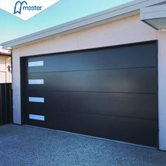 a black garage door with white stripes on the side and an image of a house in the background