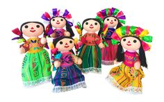 mexican dolls with colorful dresses and hair are arranged in a row on a white background