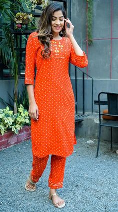 Original bandhni (kutch-bhuj) Pant-Kurti Set Kurti- rayon bandhani kurti with gotta and hand work  Pant- rayon bandhni pant with gotta lace Quality: 100 % Guaranteed Stitched: Yes Full Stitched Sleeve length: 3/4 sleeve Pockets: No Leg/hem length: Mid-calf Neckline: Boat Kurta style: Straight Fabric technique:  Embroidered Wash Care: Machine Wash & Hand Wash In Cold Water Using Mild Detergent. Shipping - We use globally known Logistics for best services like Fed-Ex, DHL, India Post. It usually takes around 7 - 15 day to deliver in Standard Delivery OR 3 - 7 Day in Express. Return - We gladly accept return in light of Etsy Guidelines. Please contact us before raising a Return Request, we may be more useful in resolving your issues. Thank you so much for visiting. Have a great day ahead! Fitted Orange Bandhani Traditional Wear, Fitted Pant Set With Zari Work For Diwali, Orange Anarkali With Bandhani Print, Fitted Orange Palazzo Set For Festive Occasions, Orange Bandhani Print Sharara For Festive Season, Festive Orange Sharara With Bandhani Print, Festive Orange Bandhani Print Sharara, Fitted Bollywood Pant Set For Eid, Fitted Bollywood Pant Set For Festive Season