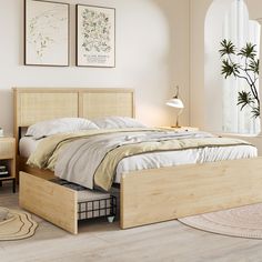 a bed sitting in a bedroom next to a window with plants on the wall behind it