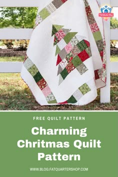 a white fence with a quilt on it and the text free quilt pattern charming christmas quilt pattern