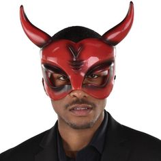 This devil half mask features a pair of horns molded contours and a furrowed brow. It's painted red with black details giving it a worn look. Adult Black & Red Horned Devil Plastic Half Mask product details: 10.4in wide x 8.7in tall Felt lining High gloss finish Elastic strap Rear hook-and-loop closure Plastic felt and elastic One size fits most teens and adults Spot clean only Furrowed Brow, Devil Mask, Half Mask, Half Face Mask, Halloween Store, Face Mask Black, Halloween Costume Accessories, Adult Halloween Costumes, Halloween Masks