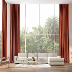 a modern living room with large windows and wooden flooring, along with white furniture