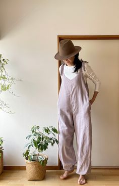 This is a very comfortable 100% cotton summer jumpsuit. Using exactly the same cotton for lining.  It is very soft and gentle touch to your skin. There are side pockets.   - Material: 100% cotton -Double Cotton ( 2 layers ) - 4 colors :  Cream ( Sold out ) Olive Black ( Sold out ) Lavender Same design in Indigo( natural dye) from here: https://www.etsy.com/listing/1010700778/indigo-jumpsuits-indigo-overalls-indigo?ref=shop_home_feat_2&frs=1 - Side Pockets - Size  - Bust : Approx 100cm/ 39" - Hip : Approx. 112cm/45" - 2 length options: ( Adjustable with the shoulder strap ) - Short length : shoulder to hem Approx. 135cm/53", Fits to the height from approx. 155cm/ 5 ft  to 165 cm / 5.4f  - Long length :  shoulder to hem Approx. 145 cm/ 57" Fits to the height from approx. 170cm/ 5.5f  to 175c Cotton Loungewear Overalls, Cotton Overalls For Loungewear, Cotton Loungewear Jumpsuit Overall, Solid Cotton Overalls For Loungewear, Cotton Overall Jumpsuits For Loungewear, Comfortable Cotton Jumpsuits And Rompers With Pockets, Cotton Jumpsuit For Loungewear, Comfortable Cotton Solid Color Jumpsuits And Rompers, Comfortable Solid Cotton Jumpsuits And Rompers