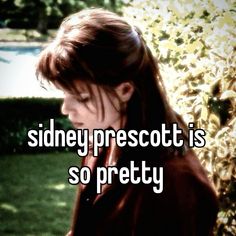 a woman standing in front of a bush with the words sidney prescot is so pretty