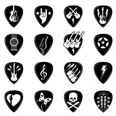 black and white guitar picks with different symbols