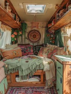 the interior of an rv decorated in bohemian style