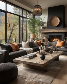 a living room filled with furniture and a fire place in front of a large window