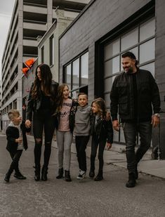 a family walking down the street together