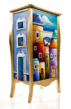 an artisticly painted cabinet is on display