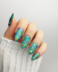 Soft yet striking, these Teal Velvet Nails with Dried Flowers are perfect for St. Patrick's Day nails 2025. They add a subtle touch of elegance to your March nails. Discover more st patricks day nail designs and green nail ideas today!