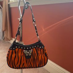 Nwt Authentic Michel Angelo Bag. Beautiful Very Soft Orange/Black Fur. Leather Trim With Swarovski Crystal Butterfly Embellishments On The Front Leather Handle With Silver Hardware Comes With Dust Bag Fiorucci Bag, Michel Angelo, On-the-go Hobo Bag With Metal Hardware, Orange Travel Bag With Silver-tone Hardware, Orange Bags With Silver-tone Hardware, Orange Satchel Shoulder Bag With Gold-tone Hardware, Luxury Orange Bags With Silver-tone Hardware, Luxury Orange Bags With Gold-tone Hardware, Orange Leather Shoulder Bag With Gold-tone Hardware