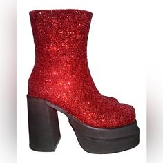 Trickz N' Treatz Mystical Sparks Platform Boots Cuz You're A Wicked One. Make A Statement With These Glitter Boots That Have A Round Toe Design, Platform Soles, Block Heels, And Side Zip Closures. Trendy Red Platform Boots With Round Toe, Red Platform Boots With Reinforced Heel For Party, Luxury Red Platform Boots With Round Toe, Red Platform Boots, Red Ankle-high Platform Boots For Parties, Dolls Kill Shoes, Red Platform, Glitter Boots, Red Glitter