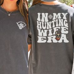 "In My Hunting Wife Era Comfort Colors Tshirt is the perfect gift for any hunting wife for birthday, Christmas, or Anniversary! If you would like something besides \"Hunter's Wife\" on the front pocket, such as your last name, please enter that in the personalization box.  If you want \"Hunter's wife\" on the front pocket you can leave it blank. This shirt fits true to size.  If you want an oversized look, order one size up.  If you want the oversized dress look, order two sizes up. This is made Womens Hunting Shirts, Hunters Wife, Deer Hunter, Comfort Colors Tshirt, Deer Hunters, Hunting Season, Hunting Gear, Comfort Colors Shirt, Oversized Dress