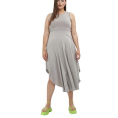 Introducing our V-Neck Knit Maxi Flare Dress, a perfect blend of comfort and elegance for your wardrobe. Crafted from a premium fabric blend of 97% viscose and 3% elastane, this dress offers a soft, luxurious feel with just the right amount of stretch for a flattering fit. The round-neck design enhances the neckline, with a cool asymmetrical hemline creating a sophisticated and timeless silhouette. The maxi length and flared skirt provide a graceful flow and effortless movement, making it ideal Cotton Loungewear, Print Coat, Khaki Dress, Swimsuit Fashion, Flared Skirt, Asymmetrical Hem, Hoodie Top, Active Wear Tops, Flare Skirt