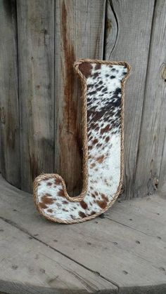 the letter j is made out of cowhide