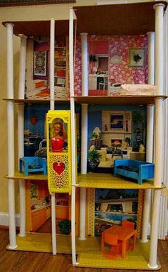 a doll house with furniture and accessories in it