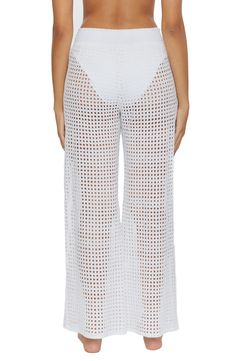 Embody the beauty of the sea in these airy cover-up pants that stun the eye with repeating cutouts and a smocked waist. 30" inseam; 22" leg opening; 13" front rise; 15 1/2" back rise (size Medium) Pull-on style Side slits 100% cotton Hand wash, line dry Imported White High-cut Leg Bottoms For Summer, Casual High-cut Leg Bottoms For Vacation, White Pants For Beach Cover-up In Spring, White Stretch Bottoms For Beach Party, White Beachwear Pants With Elastic Waistband, White Tie-side Pants For Beach Season, White High-waisted Beachwear Bottoms, White Bottoms With Elastic Waistband And High-cut Leg, White Bottoms For Poolside Vacation