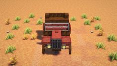 a red truck parked in the middle of a desert with trees and bushes around it