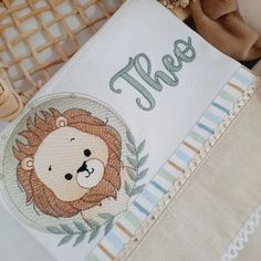 a close up of a pillow with a lion on it's face and the word flee