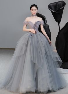 Off shoulder evening dress, gray party dress,elegant bridal dressMaterial:tulleColor:as picture or custom colorNeckline:off shoulderBack details:bandageStyle:elegantDress type:ball gown&ltp&gtFeatures:applique&lt/p&gt&ltbr/&gt&ltp&gtCustomized service and Rush order are available.&lt/p&gt&ltbr/&gt&ltp&gtThis dress could be custom made, there are no extra cost to do custom size and color.&lt/p&gt&ltbr/&gt&ltp&gtPlease leave your phone number for shipping when you order the dress.&lt/p&gt&ltbr/&gt Gray Evening Dress, Tutu En Tulle, One Shoulder Dress Long, Grey Evening Dresses, Tulle Long Prom Dress, Off Shoulder Evening Dress, Rush Dresses, Langer Rock, Tulle Tutu