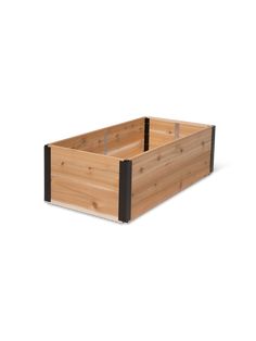 a wooden box with two black sides on a white background