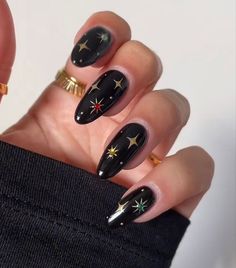 Gel Nail Designs Dark Colors, Engagement Nails Colorful, Moon Design On Nails, Dark Nails With Stars, December Nails Short Almond, Autumn Witchy Nails, Black Gold Star Nails, Celestial Halloween Nails, Simple Nail Art Halloween