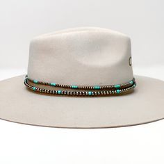 Copper Tone and Turquoise Pearl Hat Band With Black Tie Strings. Pictured on a white background with the band around a light brown/ gray hat. Adjustable Brimmed Felt Hat For Kentucky Derby, Kentucky Derby Adjustable Short Brim Felt Hat, Adjustable Felt Hat For Kentucky Derby With Short Brim, Adjustable Flat Crown Hats For Kentucky Derby, Adjustable Hat For Kentucky Derby And Country Events, Adjustable Hats For Kentucky Derby And Country Events, Adjustable Casual Felt Hat For Kentucky Derby, Adjustable Fedora For Country Events, Adjustable Casual Felt Hat With Flat Crown