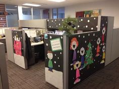 an office cubicle decorated with christmas decorations