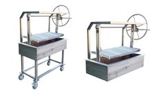 two metal carts with wheels on each side and one cart holding trays for food