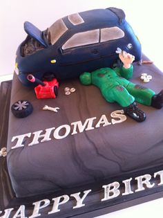 a birthday cake with a car on it