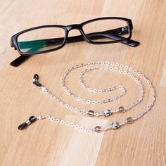 Modern glasses chain - Dalmatian jasper gemstone and grey bead eyewear chain A simple combination of dalmatian jasper gemstones with grey faceted glass beads feature in a silver tone oval link chain. Perfect for everyday wear and keeping your glasses or sunglasses handy. Finished with spectacle ends to hold your glasses. Approximately 26 inches long. Handmade in the UK, in stock and ready to ship. More glasses chains available in my store here - https://www.etsy.com/shop/inspira?section_id=20362 Elegant Handmade Metal Glasses Chains, Silver Beaded Metal Glasses Chain, Silver Metal Beaded Glasses Chain, Modern Metal Glasses Chains With Adjustable Chain, Adjustable Glasses Chains For Everyday Use, Everyday Silver Glass Jewelry, Handmade Silver Metal Glasses Chains, Silver Beaded Glass Chain For Glasses, Adjustable Silver Metal Glasses Chains