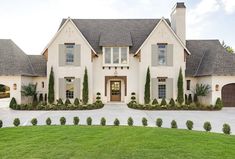 a large white house with lots of windows