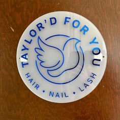 a white and blue sticker that says taylor'd for you hair nail - lashes