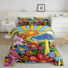 a bed covered in lots of colorful flowers