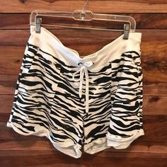 Size Large Drawstring Waist Rolled Hem Side Pockets White With Black Zebra Pattern Cotton/ Polyester Machine Wash Measures At 17” Waist 3.75” Inseam Great Condition! Washed Never Worn! Smoke Free Home! Casual Zebra Print Bottoms For Summer, Casual Zebra Print Summer Bottoms, White Stretch Bottoms With Zebra Print, White Stretch Zebra Print Bottoms, White Zebra Print Stretch Bottoms, Casual Stretch Zebra Print Bottoms, White Zebra Print Casual Bottoms, White Zebra Print Bottoms For Summer, Zebra Pattern